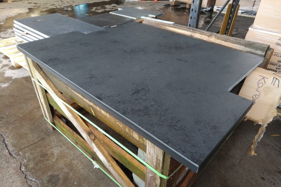 A wide T-shaped slate hearth cut and ready for delivery in February