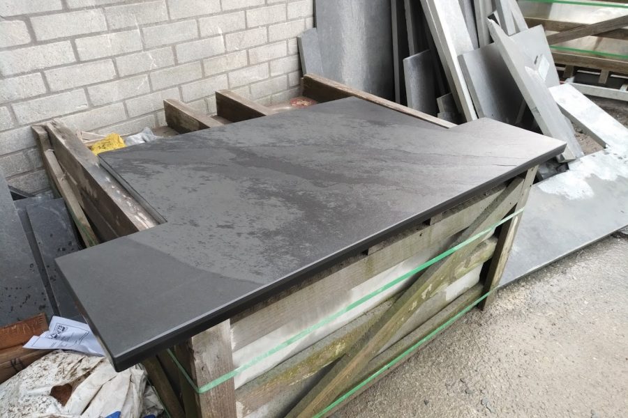 Bespoke T-shaped slate hearth at the end of preparation