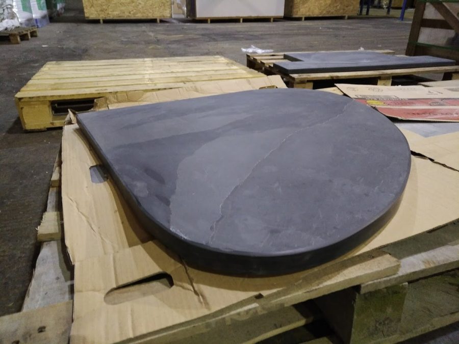 Bespoke thick teardrop shaped slate hearth ready to go