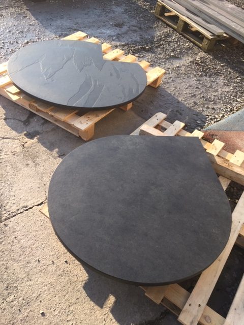 Circular slate hearth with pointy bit for a corner