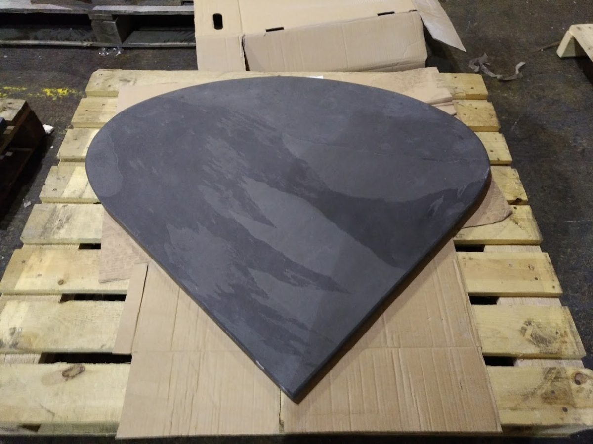 Long teardrop shaped slate hearth ready for delivery