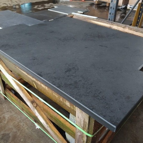 A wide T-shaped slate hearth cut and ready for delivery in February