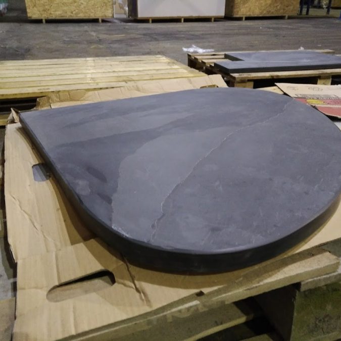 Bespoke thick teardrop shaped slate hearth ready to go