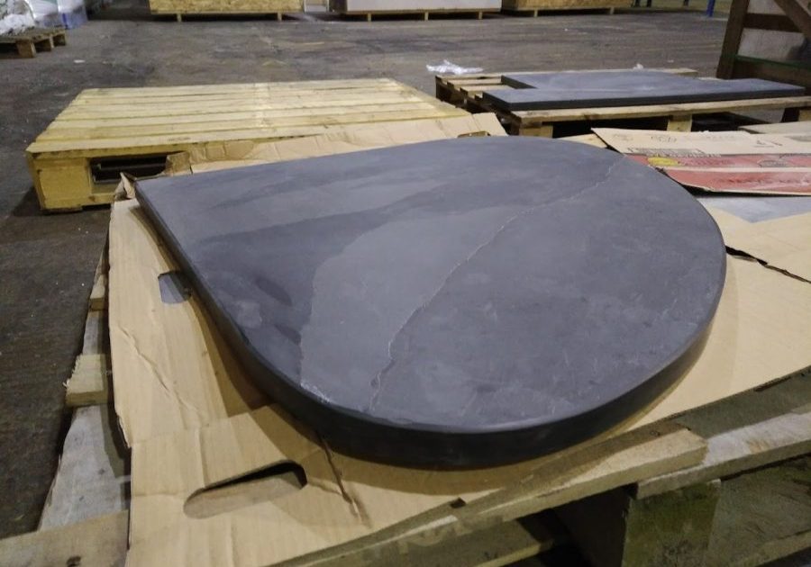 Bespoke thick teardrop shaped slate hearth ready to go