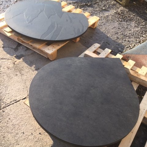 Circular slate hearth with pointy bit for a corner