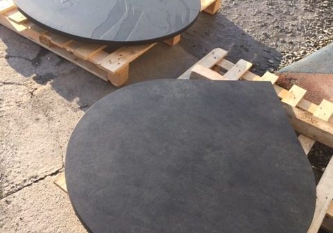 Circular slate hearth with pointy bit for a corner
