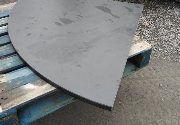 Curved-slate-hearth-for-a-corner
