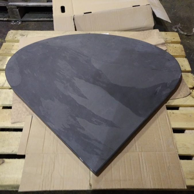 Long teardrop shaped slate hearth ready for delivery