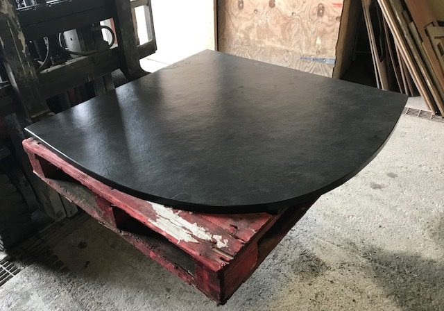 Polished curved corner slate hearth ready for delivery