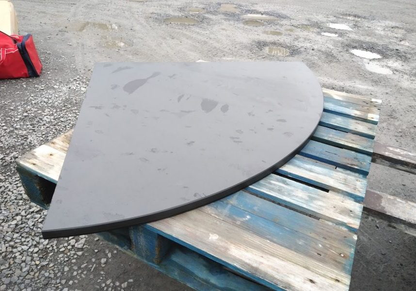 Right-angled curved slate hearth for a corner stove