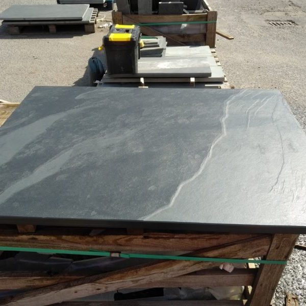Square slate hearth ready to meet its new home
